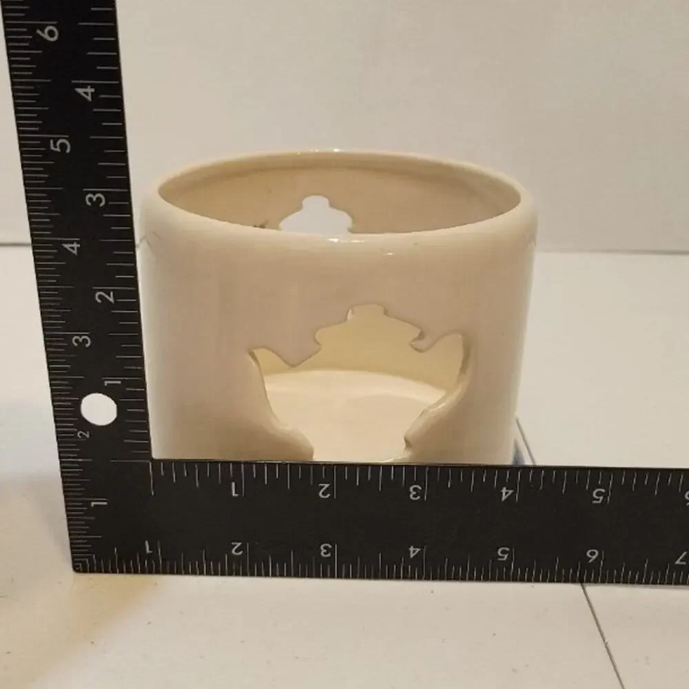 Mrs. Potts teapot cutout candle holder
